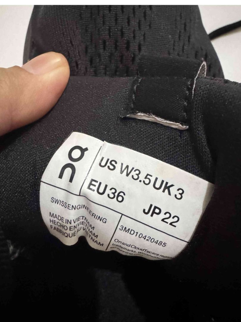 On CloudTec Running Shoes Black US W3.5 EU36 (Category: Sneakers) located in Goa. Submitted by cheaperbythedozen26 (Listing ID 1441255724, Image 2). Description: - Brand: On Running Shoes - Origin: Swiss Engineering, Made in Vietnam - Size: US W3.5 / EU36 / UK 3 / JP 22 - Color: Black - Functionality: Still good for running but may flaw (please see photo), all goods just need glue!.