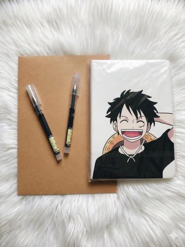 One Piece Luffy Notebook and Black Pens Set (Category: Stationery & School Supplies) located in San Pedro. Submitted by ronamievsuazo (Listing ID 1441254002, Image 1). Description: - Cute One Piece Luffy themed notebook - Includes two smooth-writing black gel pens - Ideal for taking notes or drawing - Perfect gift for any anime fan - Features a plain brown back cover.