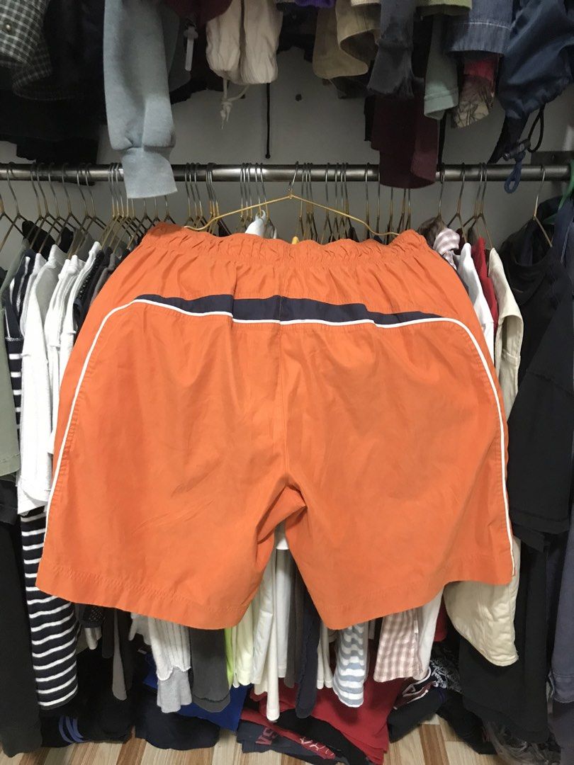 Orange Swim Shorts (Category: Shorts) located in Manila. Submitted by terlterlterl (Listing ID 1441346694, Image 3). Description: 34 waist 21 length 12.5 leg opening issue see last photo.