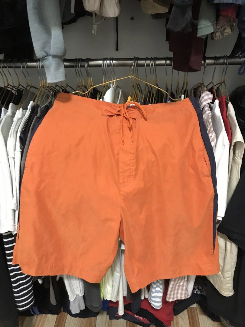 Orange Swim Shorts (Category: Shorts) located in Manila. Submitted by terlterlterl (Listing ID 1441346694, Image 1). Description: 34 waist 21 length 12.5 leg opening issue see last photo.