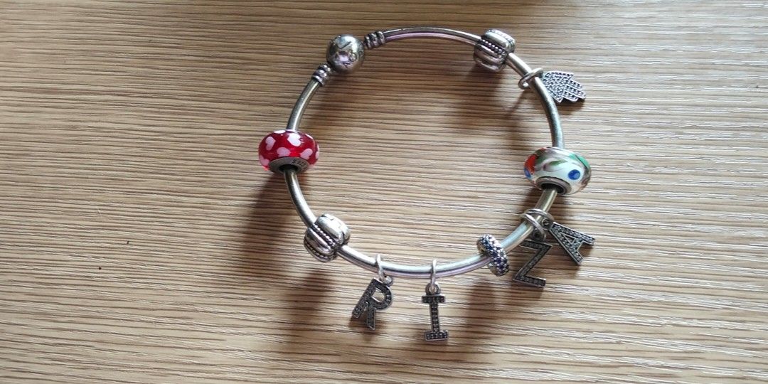 original pandora bangle and bracelet with charms (Category: Luxury Accessories) located in Zamboanga. Submitted by mara_30 (Listing ID 1441283090, Image 2). Description: original pandora bracelet and bangle with charms bought in monaco,france.
