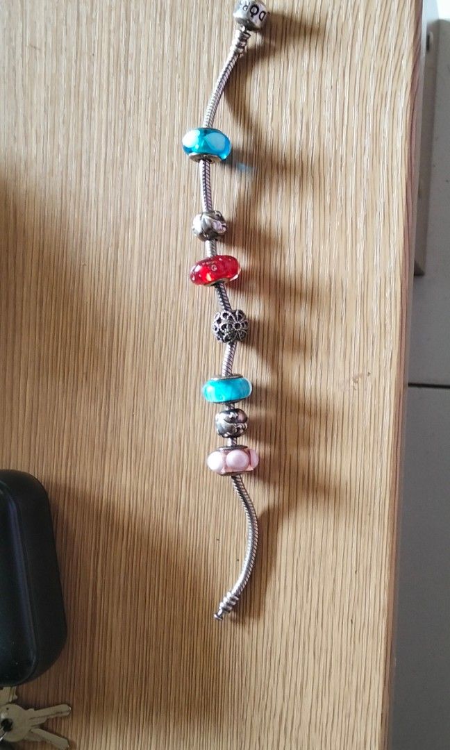 original pandora bangle and bracelet with charms (Category: Luxury Accessories) located in Zamboanga. Submitted by mara_30 (Listing ID 1441283090, Image 1). Description: original pandora bracelet and bangle with charms bought in monaco,france.