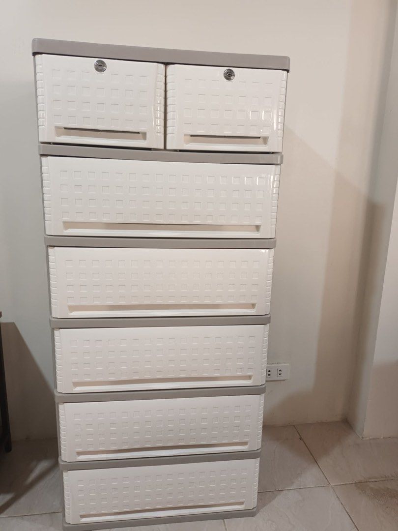 Orocan Cubico Plastic Storage Cabinet with Drawers (Category: Shelves, Cabinets & Racks) located in Quezon City. Submitted by mrslim91 (Listing ID 1441324860, Image 1). Description: - Brand: Orocan - Tall plastic storage cabinet - 8 drawers total (top 2 are smaller) - White with grey trim - Ideal for organizing clothes or other items - Easy to open and close - Suitable for any room in the house - I have three of these. Free SF within Metro Manila