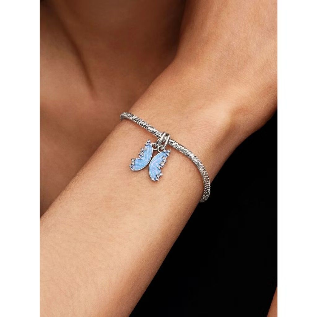 Pandora Sparkling Blue Butterfly Wing Charm (Category: Bracelets) located in Manila. Submitted by buenaventura.922 (Listing ID 1441287989, Image 1). Description: - Sparkling blue butterfly wing charm - Adorned with cubic zirconia stones - Perfect for Pandora bracelets - Adds a touch of magic - Ideal for gifting or personal treat.