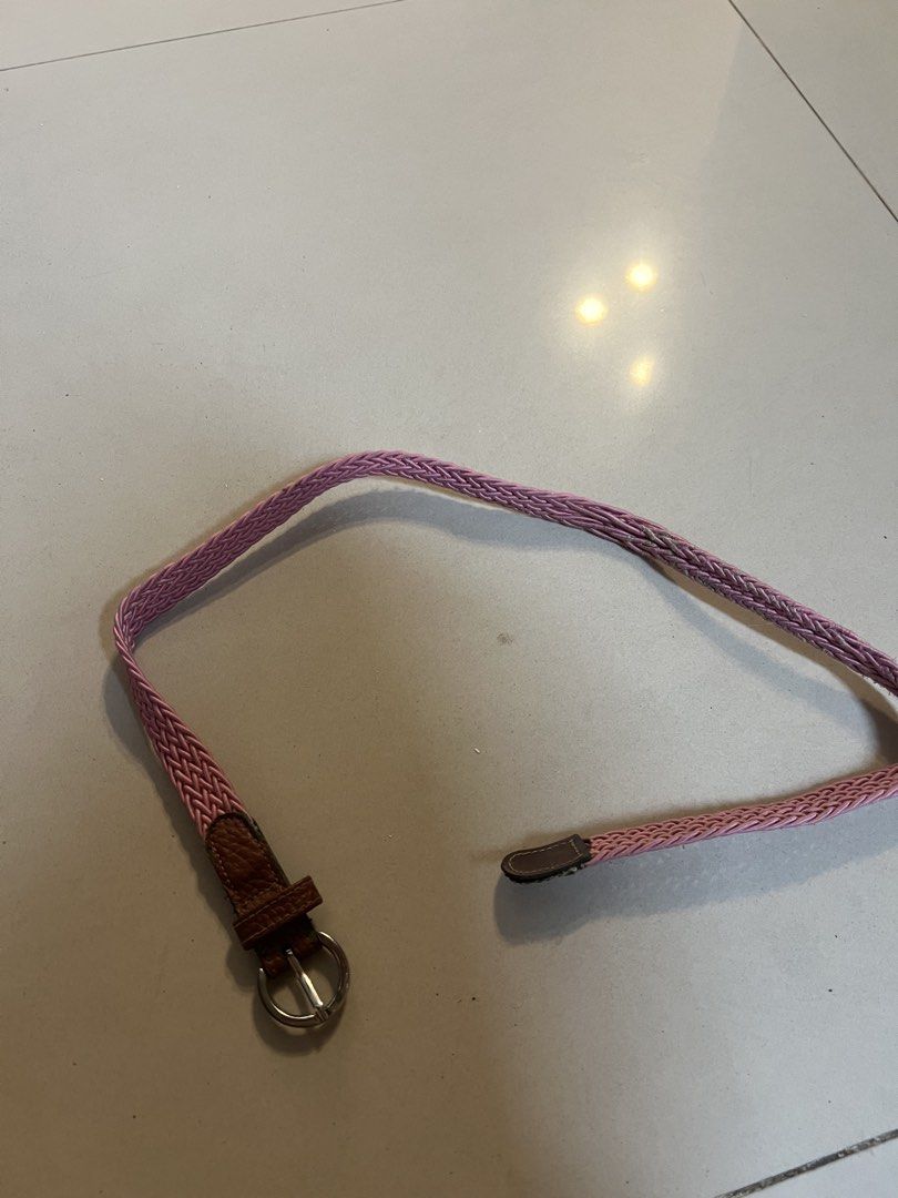 Pink Braided Belt with Silver Buckle (Category: Belts) located in Makati City. Submitted by abbynak (Listing ID 1441261199, Image 1). Description: Pink braided belt with brown leather end and silver buckle. Adds a pop of color and is easily adjustable..