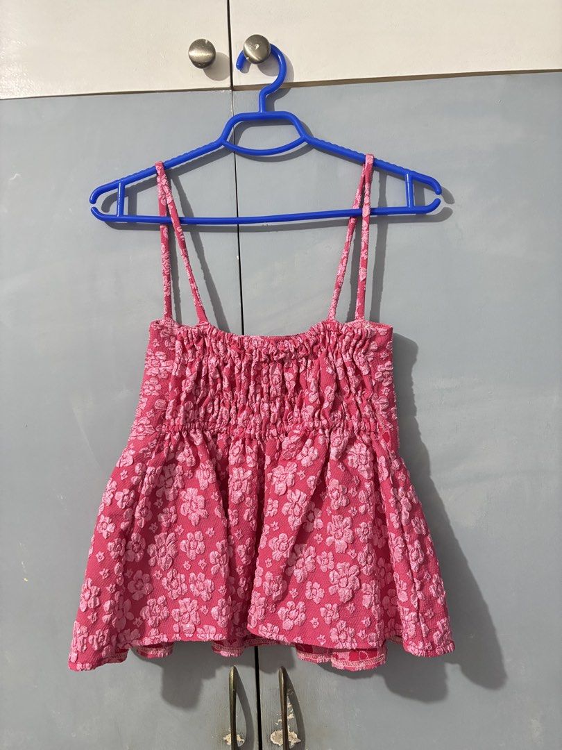 Pink Floral Embossed Top (Category: Sleeveless) located in Las Pinas. Submitted by by.andreaa (Listing ID 1441181715, Image 2). Description: - Adorable pink camisole top - Flared hem with stylish pleats - Estimated size: Regular Size from TikTok shop but can fit up to XL frame - Worn twice only Photo as is. No when worn..