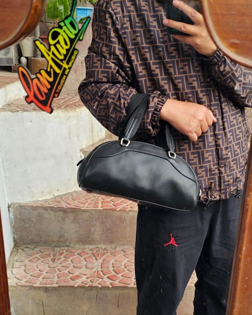 🛑Prada Black Leather Zip Bowler Bag (Category: Luxury Bags & Wallets) located in Baguio. Submitted by bagluxers_haven (Listing ID 1441302408, Image 3). Description: 🛑Authentic Prada Black Soft Calfskin Leather Zip Closure Bowler Bag w/ Dual Flat Canvas Top Handle & a Digital Padlock 》Small to medium w/ a spacious jacquard lined interior. 》Djom Djom 🛑Lightly Used, Very Good Condition but no more inclusions. No Flaw. 🛑DIMENSION : 11.5"L X 6"H X