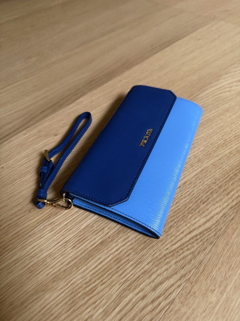 Prada Vitello Move Bicolor Flap Pochette Wristlet (Category: Luxury Bags & Wallets) located in Pasay City. Submitted by elleventh (Listing ID 1441192568, Image 3). Description: - Rank SA-A - Comes with inclusions (as seen in first photo) - Can still be gifted - 7.25” x 4.25” x 1” All items are guaranteed authentic and are personally curated and sourced by the founder. If you wish to get a certificate of authenticity from a trusted third party com
