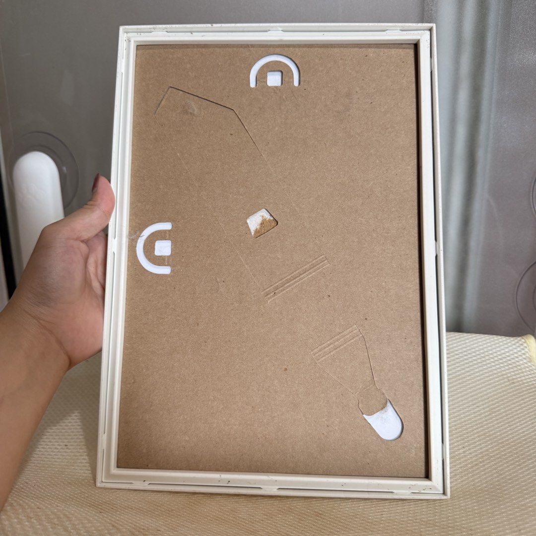 PRELOVED White Plastic Frame with Laminated Printed Artwork Nordic (Category: Wall Decor) located in Mandaluyong City. Submitted by elite.essence.ph2 (Listing ID 1441228559, Image 2). Description: Plastic, no glass cover..