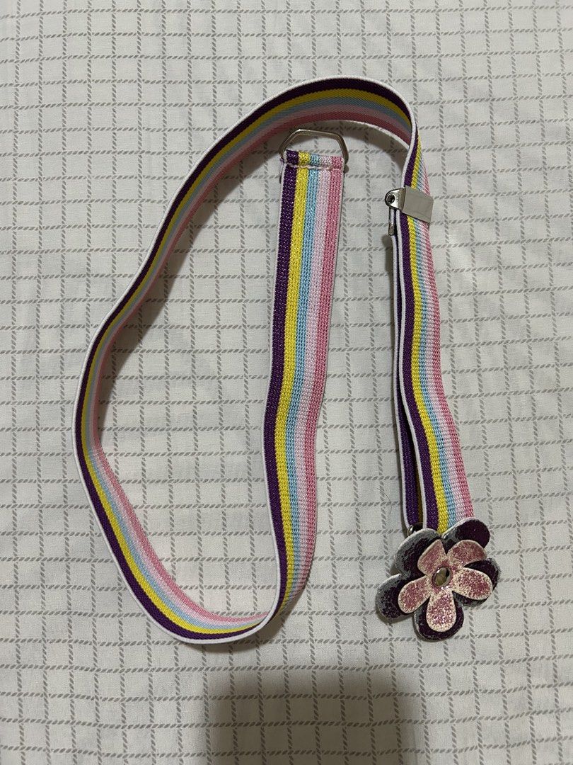 Rainbow Stretchable Belt for Girls (Category: Babies & Kids Fashion) located in Quezon City. Submitted by practicalnanay (Listing ID 1441198926, Image 1). Description: - Adorable rainbow-colored stretchable belt for girls. - Features vibrant stripes in various colors. - Decorated with a charming flower accent. - Comfortable and adjustable design. - Perfect accessory to brighten up any outfit. - rfs: outgrown by my daughter Shipping c/o buyer Pick