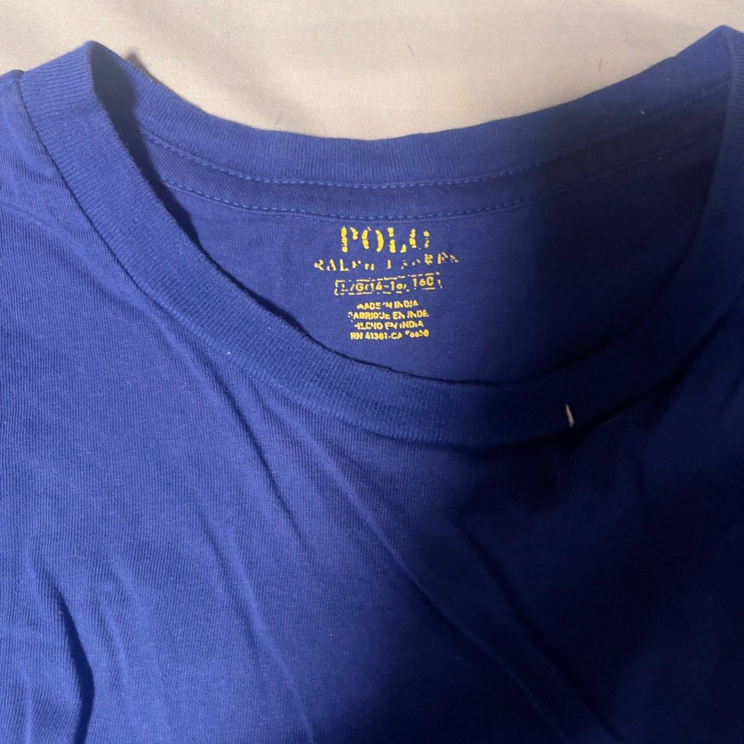 Ralph Lauren T-shirt Blue (Category: Tshirts & Polo Shirts ) located in Las Pinas. Submitted by fiyahpants (Listing ID 1441286255, Image 2). Description: Blue Ralph Lauren Polo t-shirt. Size S. Features embroidered yellow polo logo. Great for casual wear..