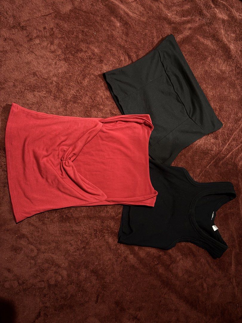 Red Twist Front Top & Black Tops Bundle (Category: Blouses) located in San Juan City. Submitted by helpabaddietodecclutter (Listing ID 1441326778, Image 1). Description: - Bundle of three tops - Includes: 1 red twist-front top, 1 black ribbed tank top, 1 black strapless top - Made from soft, stretchy fabric - Versatile for layering or wearing solo.