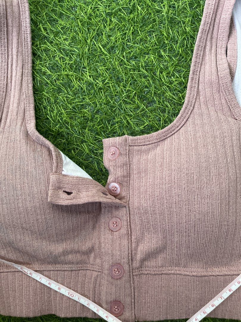 Ribbed Button Front Sports Bra Crop Top (Category: Activewear) located in Bacolod City. Submitted by marbiii (Listing ID 1441259856, Image 3). Description: - Pink ribbed sports bra - Button-front detail - U-neckline - Wide straps - Ideal for light workouts or lounging - Measurements available in photos - Note: Small WASHABLE dark mark on the right side near the strap - BEST FITS XS TO SMALL .