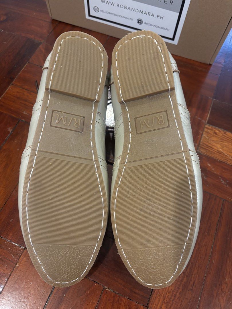 Rob & Mara Genuine Leather Wingtip Oxfords (Category: Loafers) located in Quezon City. Submitted by jcs_items (Listing ID 1441172369, Image 3). Description: - Rob & Mara genuine leather oxfords - Classic wingtip design with brogue detailing - Elegant light gold/champagne shimmer color - Durable rubber soles with R/M branding - Comes with original box.