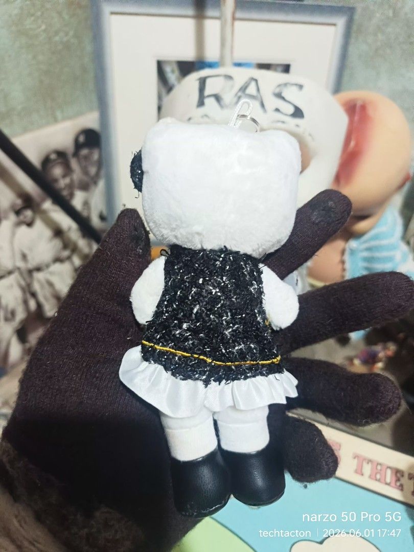 Sanrio Hello Kitty long legs charm keychain (Category: Character Goods) located in Santo Tomas. Submitted by pickers_corner (Listing ID 1441326960, Image 2). Description: Sanrio Hello Kitty long legs charm keychain featuring a black tweed dress. [1.
