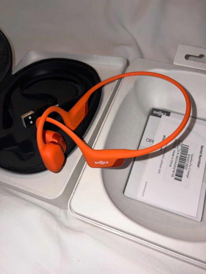 Shokz Open Run Pro 2 Earphones (Category: Earphones) located in Muntinlupa City. Submitted by lucaslovesburgers (Listing ID 1441322658, Image 2). Description: Shokz Open Run Pro 2 Earphones Used only three times Color: Orange Delivery: Grab/Lalamove Payment: Gcash.
