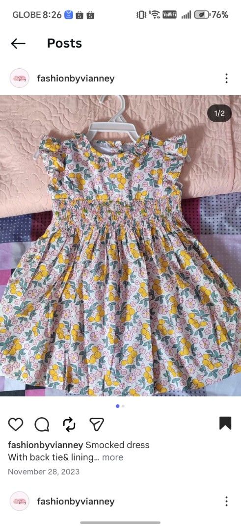 Smocked Dress with Back Tie and Lining (Category: Babies & Kids Fashion) located in Manila. Submitted by phoebegrace_sam (Listing ID 1441205963, Image 1). Description: Cute smocked dress with a floral print. Features a yellow and pink floral pattern on a white background. Has flutter sleeves and a Peter Pan collar. Includes a tie at the back for a better fit. Also lined for comfort. Great for any occasion..