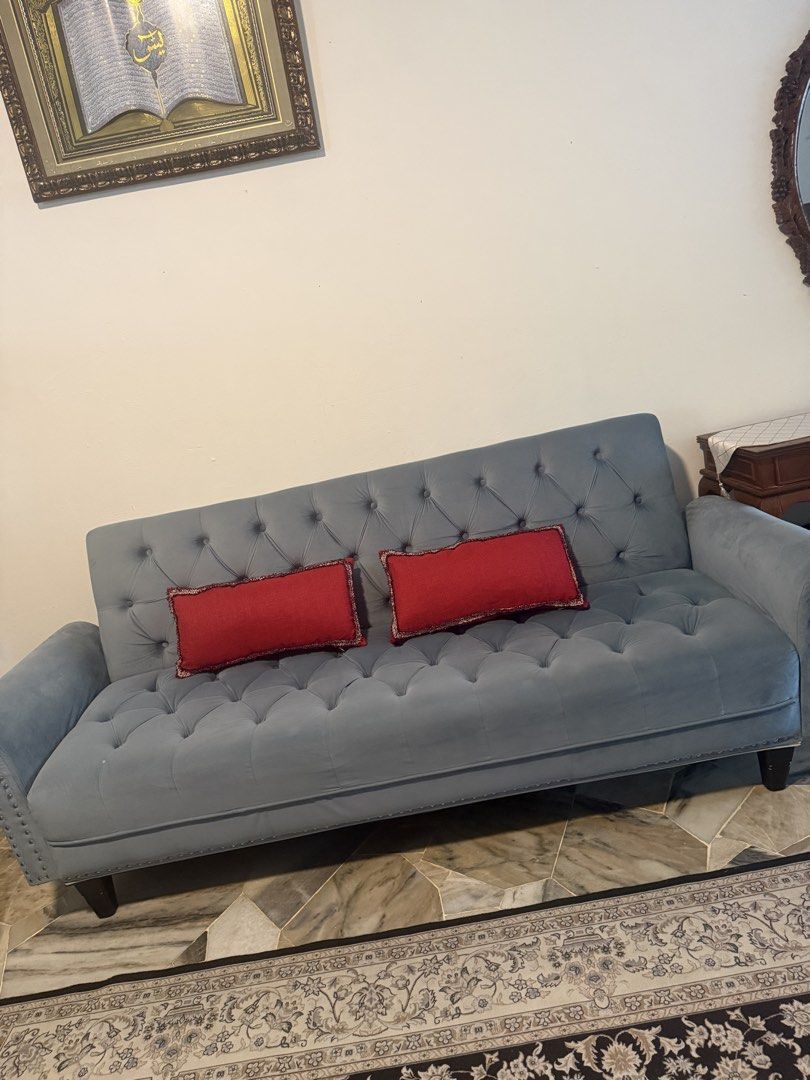 Sofa (Category: Sofas) located in Kajang. Submitted by faaaaarah (Listing ID 1441236035, Image 3). Description: - Light blue tufted sofa - Studded detailing on arms and back - Soft and plush upholstery - Minor marks on fabric (refer to last photo) - Ideal for living rooms or lounges.