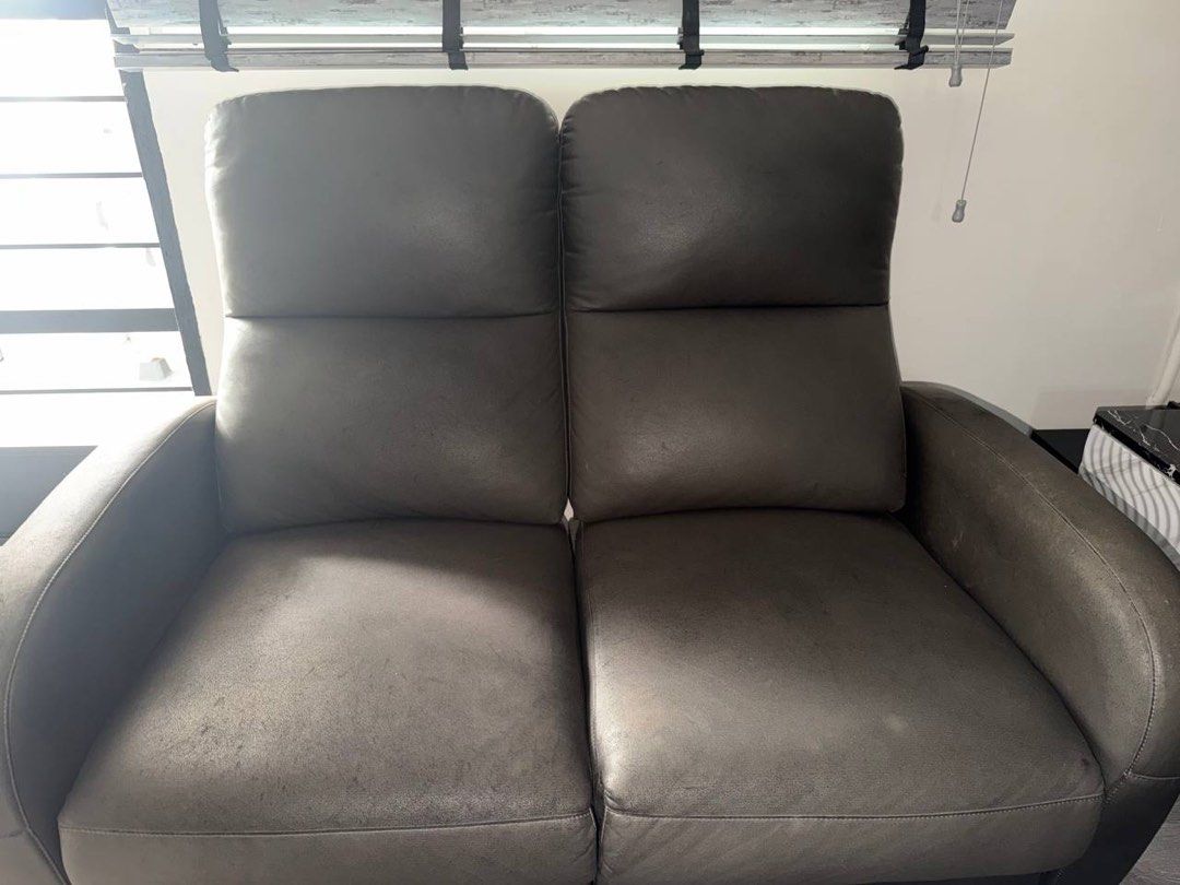 Sofa & Dining Table (Category: Sofas) located in Singapore. Submitted by nxb1l_ (Listing ID 1441292592, Image 1). Description: Two Seater Recliner Sofa With Centre Console Length - 1.65m Width - 1m Height - 90cm Asking 400 able to nego well used quite obv defects on the centre console due to nail glue spillage Two Seater Recliner Sofa Length - 1.3m Width - 1m Height - 90cm Asking 350 able to nego well used quite nothing a good clean can get rid o