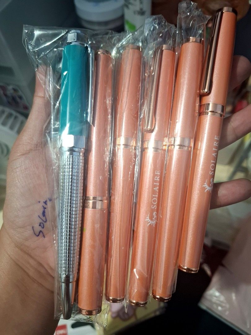 Solaire Blue Pens - sold each (Category: Stationery & School Supplies) located in Quezon City. Submitted by an.marie (Listing ID 1441319096, Image 1). Description: Solaire pens: 6 rose gold and 1 teal/silver. All individually wrapped. Perfect for gifts!.