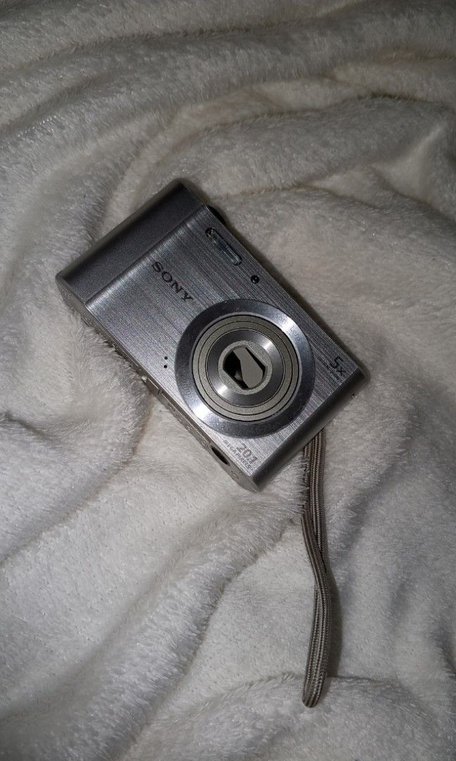 Sony Cybershot W800 Digital Camera (Category: Cameras) located in Santa Ana. Submitted by van_montoya (Listing ID 1441217071, Image 2). Description: Please feel free to message me for more sample photos! ☺️ Details: 20.1 MP - 5x Zoom - Flash Working - Sample Pictures included in the posting (slide 6-10) Issues: - Lens cover doesn't fully close after turning off but can be manually moved to fully close. (can be seen on the 1st and 2nd pic) Other t