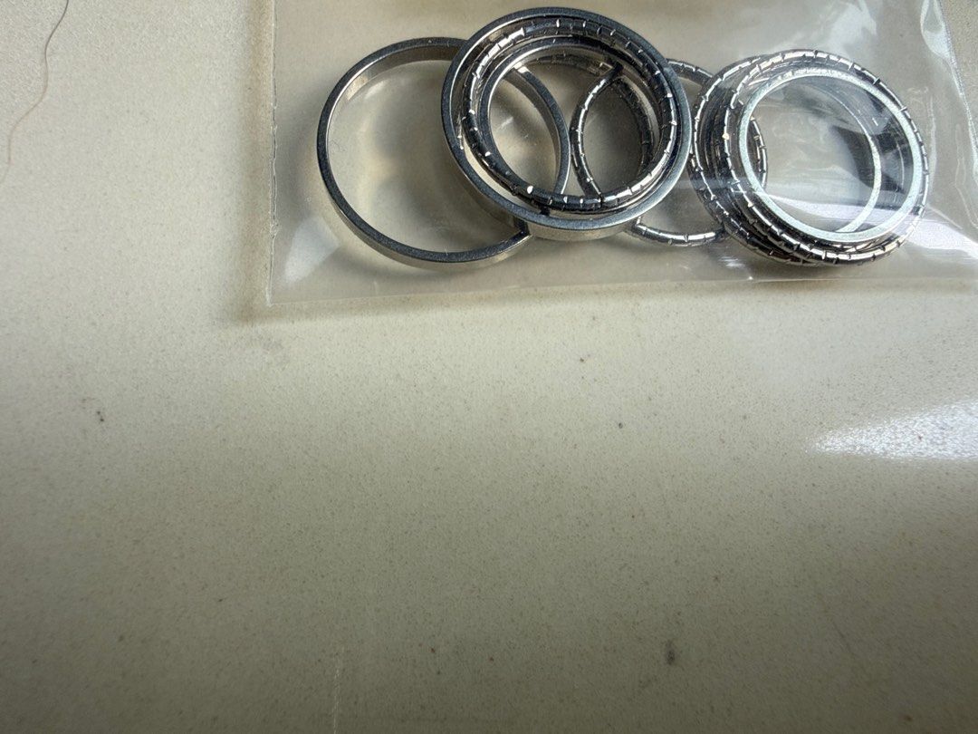 Stackable thin silver rings (Category: Other Accessories) located in Singapore. Submitted by thm08 (Listing ID 1441228757, Image 3). Description: Brand new never used - 9 rings $5 for whole set .