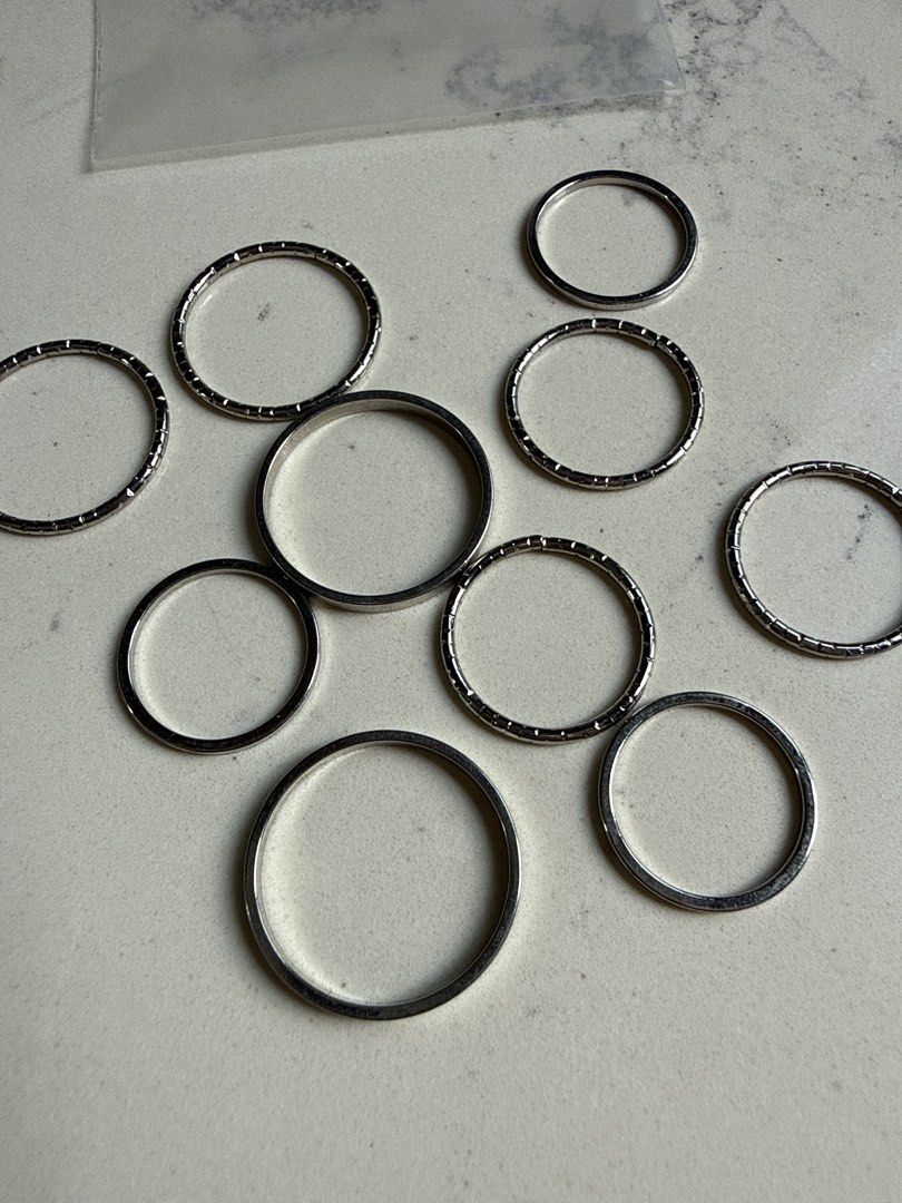 Stackable thin silver rings (Category: Other Accessories) located in Singapore. Submitted by thm08 (Listing ID 1441228757, Image 1). Description: Brand new never used - 9 rings $5 for whole set .