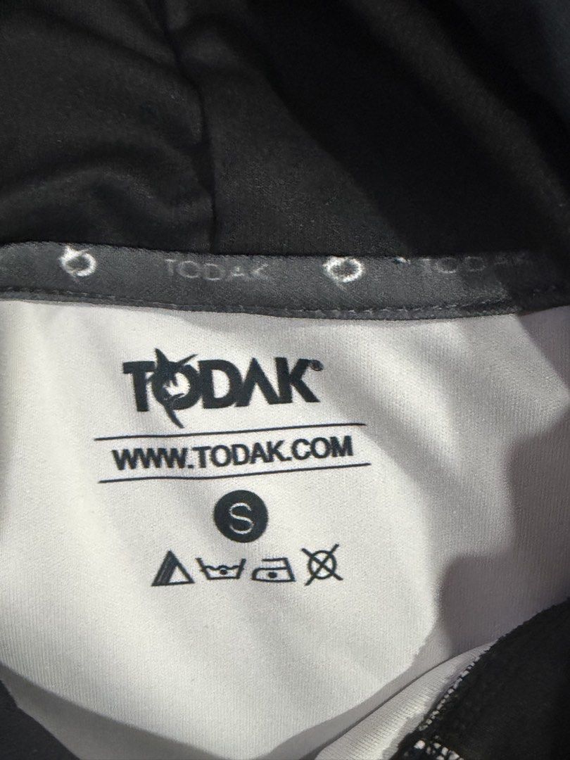 TODAK Esports Purple Hoodie | Official Merch (Category: Coats, Jackets and Outerwear) located in Johor Bahru. Submitted by farid229 (Listing ID 1441377223, Image 3). Description: Official TODAK esports hoodie featuring a premium purple gradient design with TODAK and Modkha Group branding. Comfortable polyester material with front kangaroo pocket and adjustable hood. Perfect for esports fans, casual wear, or collectors of Malaysian gaming merchand