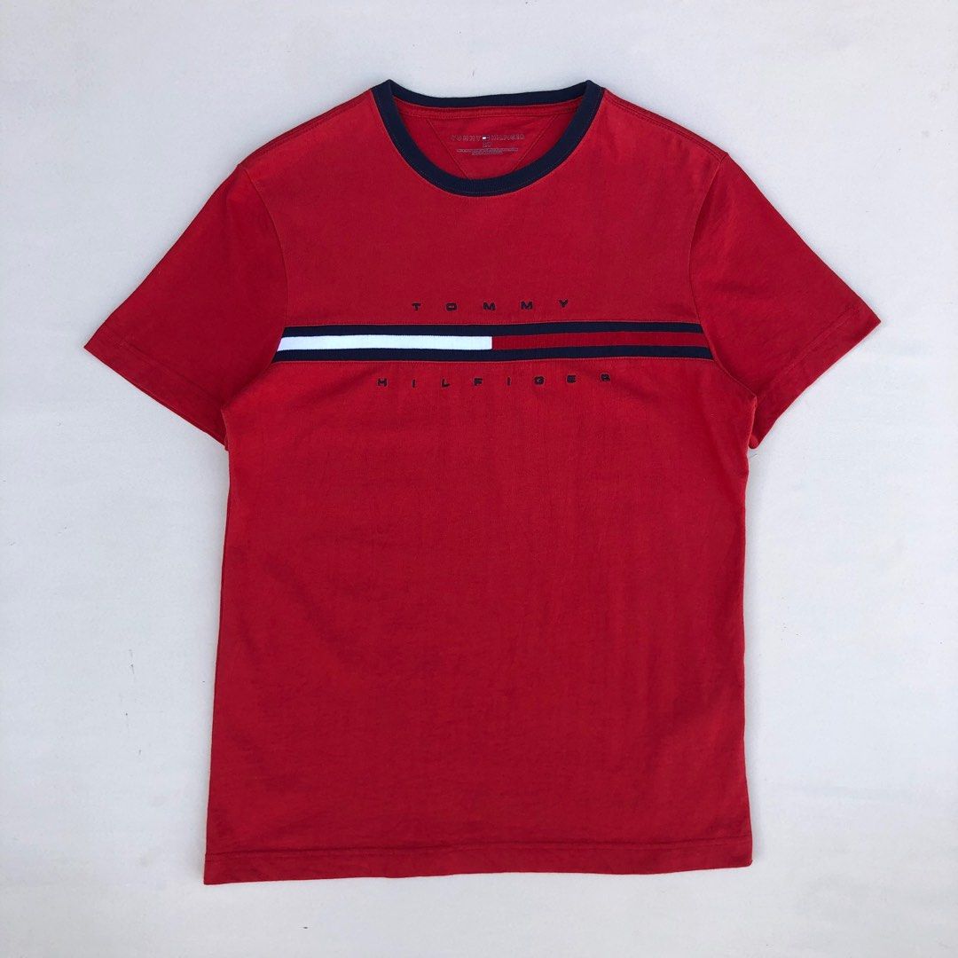 Tommy Hilfiger tino grapic Shirt (Category: Tshirts & Polo Shirts ) located in Leyte. Submitted by liamsapparel (Listing ID 1441319721, Image 2). Description: Tommy Hilfiger Tino Grapic T-Shirt Color: Red Size on Tag: Small Width: 18.5 (Pit to Pit) Length: 27 (shoulder to Hem) Best Fit: S to M Condition: Good as new Color Rate: 10/10 Issue: NONE.
