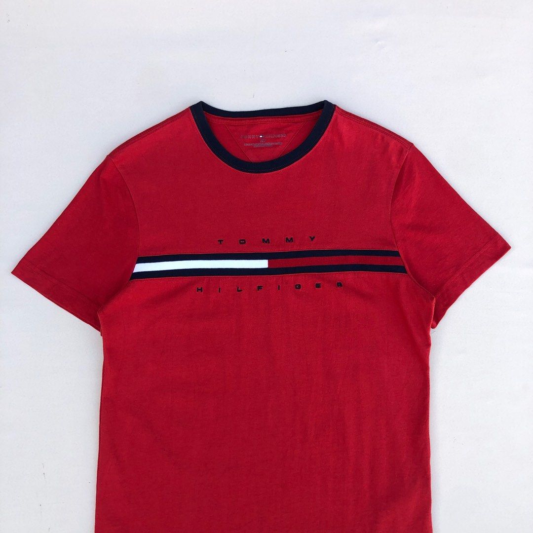 Tommy Hilfiger tino grapic Shirt (Category: Tshirts & Polo Shirts ) located in Leyte. Submitted by liamsapparel (Listing ID 1441319721, Image 3). Description: Tommy Hilfiger Tino Grapic T-Shirt Color: Red Size on Tag: Small Width: 18.5 (Pit to Pit) Length: 27 (shoulder to Hem) Best Fit: S to M Condition: Good as new Color Rate: 10/10 Issue: NONE.