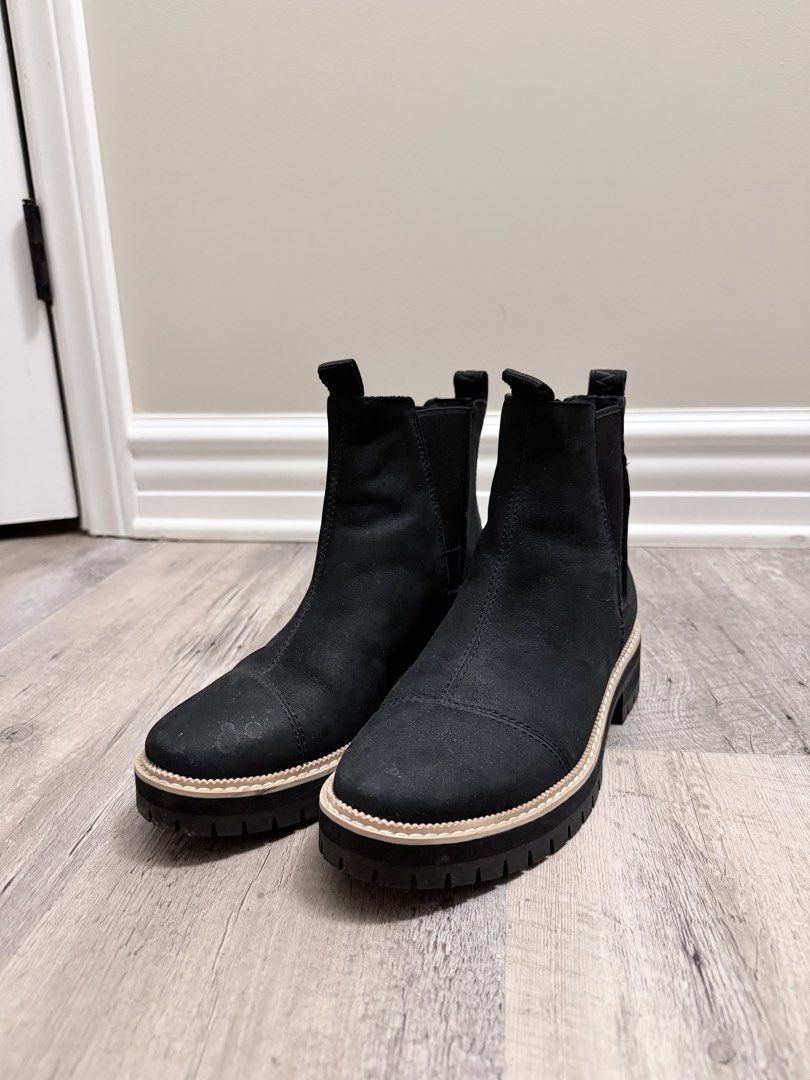 TOMS Black Chelsea Boots (Category: Boots) located in Manila. Submitted by mellowbutterfly (Listing ID 1441332125, Image 1). Description: - Brand: TOMS - Style: Black Chelsea Boots - Size: 7.5 US Women's - Features: Elastic side panels for easy on/off, chunky lug sole for excellent grip - Ideal for: Everyday wear.