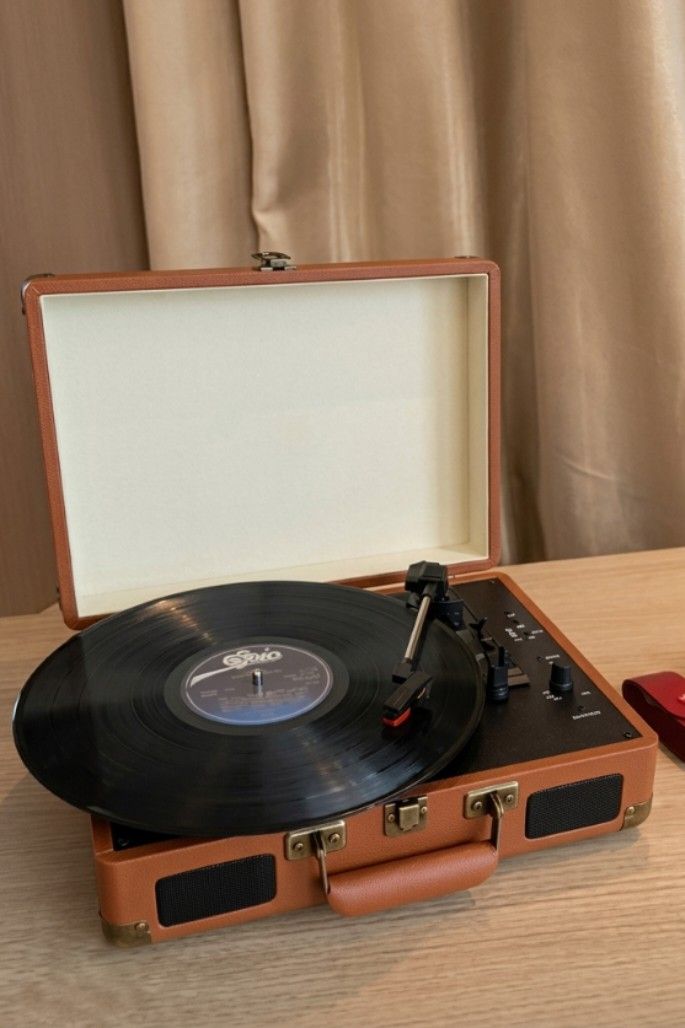Turntable vinyl record (Category: Portable Music Players) located in Makati City. Submitted by owlthriftstore (Listing ID 1441200584, Image 1). Description: Available.