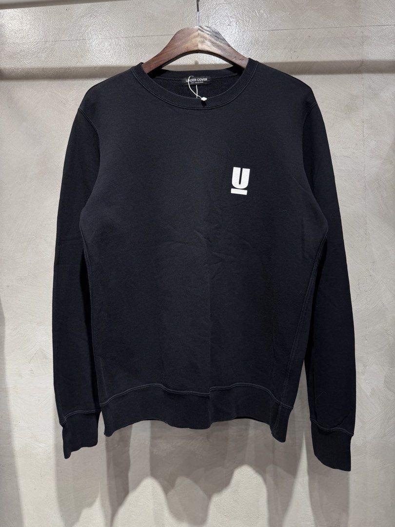 Undercover Iconic Print Crewneck Sweatshirt (Category: Coats, Jackets and Outerwear) located in Quezon City. Submitted by macleen17 (Listing ID 1441305096, Image 2). Description: Undercover Iconic Print Crewneck Sweatshirt featuring the brand’s classic minimalist “Small U” chest graphic. Designed by Jun Takahashi, this premium Japanese streetwear piece is made from 100% cotton and features a clean pullover crewneck design with ribbed finishes -Br