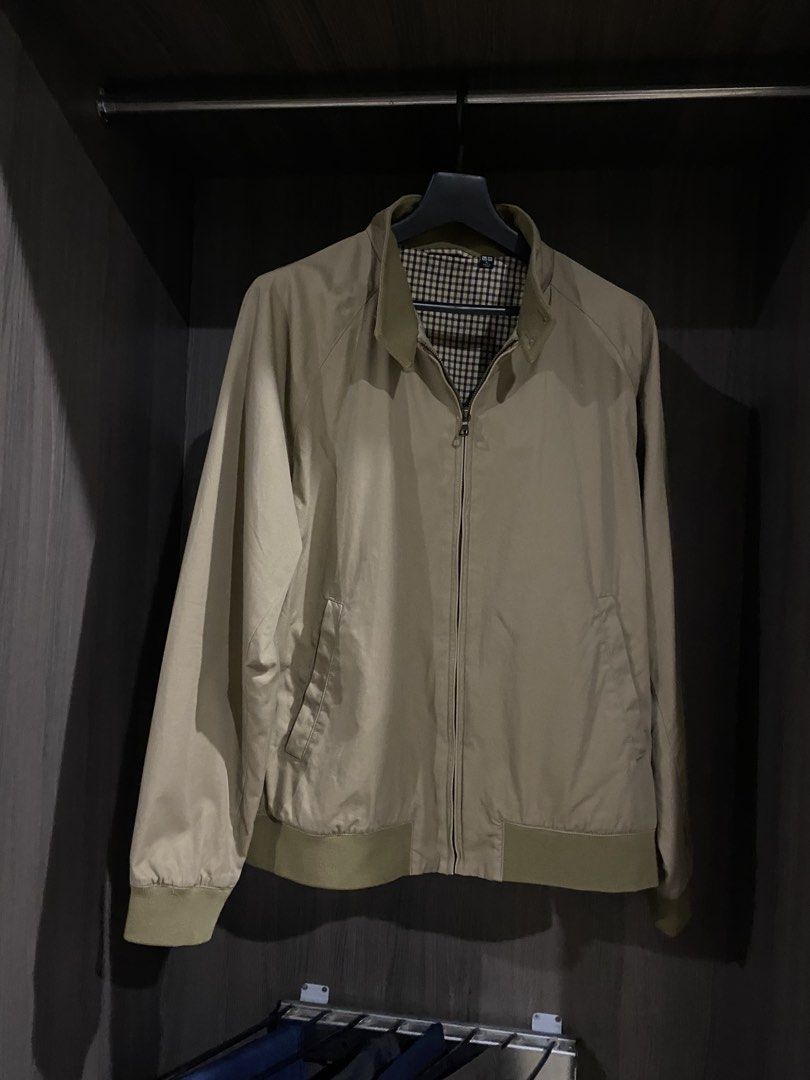 Uniqlo Harrington Jacket (size L) (Category: Coats, Jackets and Outerwear) located in Cavite. Submitted by askingryan (Listing ID 1441373876, Image 1). Description: Uniqlo - Timeless beige jacket - Classic Harrington collar - Stylish checkered lining - Zip-up front with button collar closure - Ribbed cuffs and hem for a comfortable fit - Versatile for layering over any outfit.