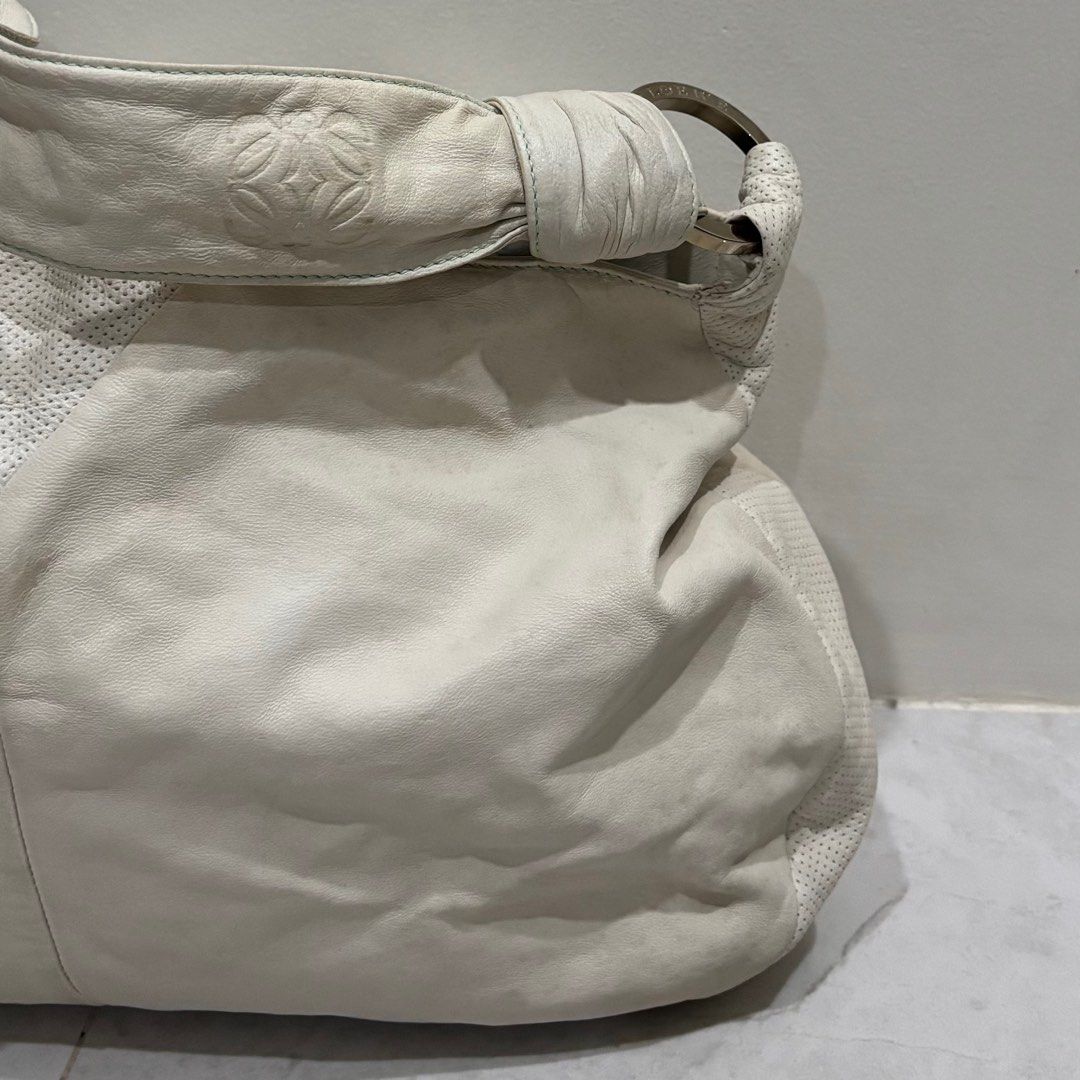 Vintage loewe top handle bag (Category: Luxury Bags & Wallets) located in Cebu City. Submitted by florianmiral (Listing ID 1441277861, Image 2). Description: Vintage loewe top handle bag Very good condition due to its age Sign of usage but still presentable and wearable .