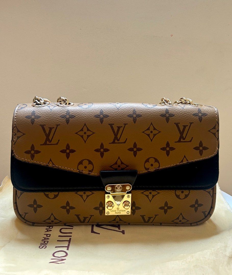 VL Sling Bag (Category: Shoulder Bags) located in Tagbilaran City. Submitted by kashitan_declutter (Listing ID 1441165021, Image 1). Description: Selling this VL sling bag. No scratches. Only used once. Sling chain in good condition. Rfs: No longer using it. .
