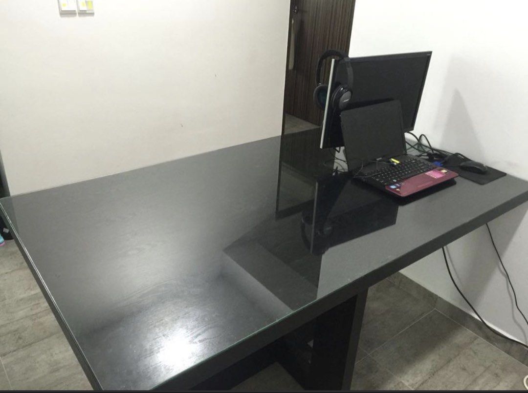 Well used dining table to clear
