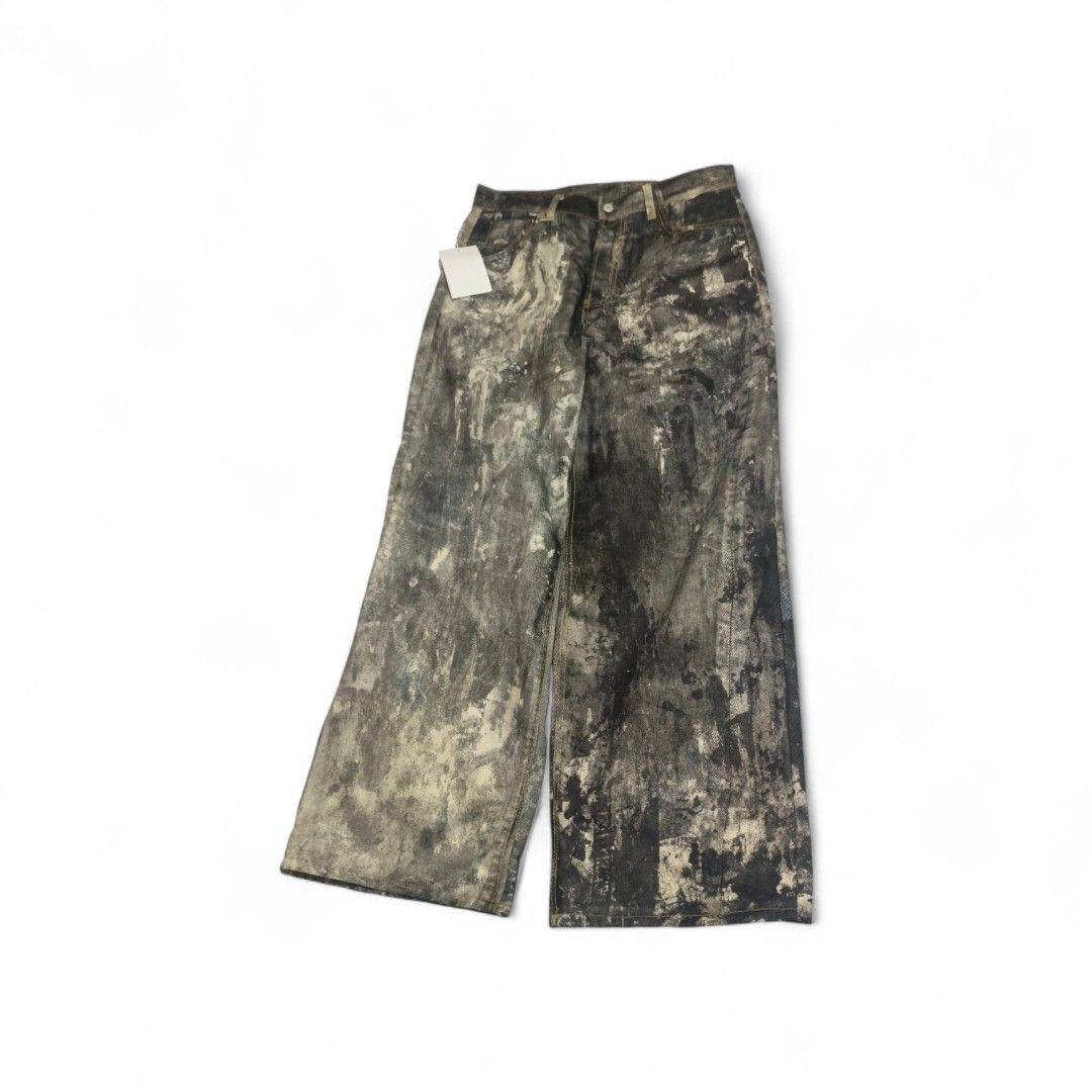 Wide Leg Jeans with Abstract Print (Category: Jeans) located in Manila. Submitted by woonyoo (Listing ID 1441230555, Image 1). Description: - Unique abstract print wide leg jeans - Colors: Grey, black, and beige - Tagged with original tags attached - Estimated size 32 (please check measurements for accurate fit) - Ideal for creating a standout outfit.