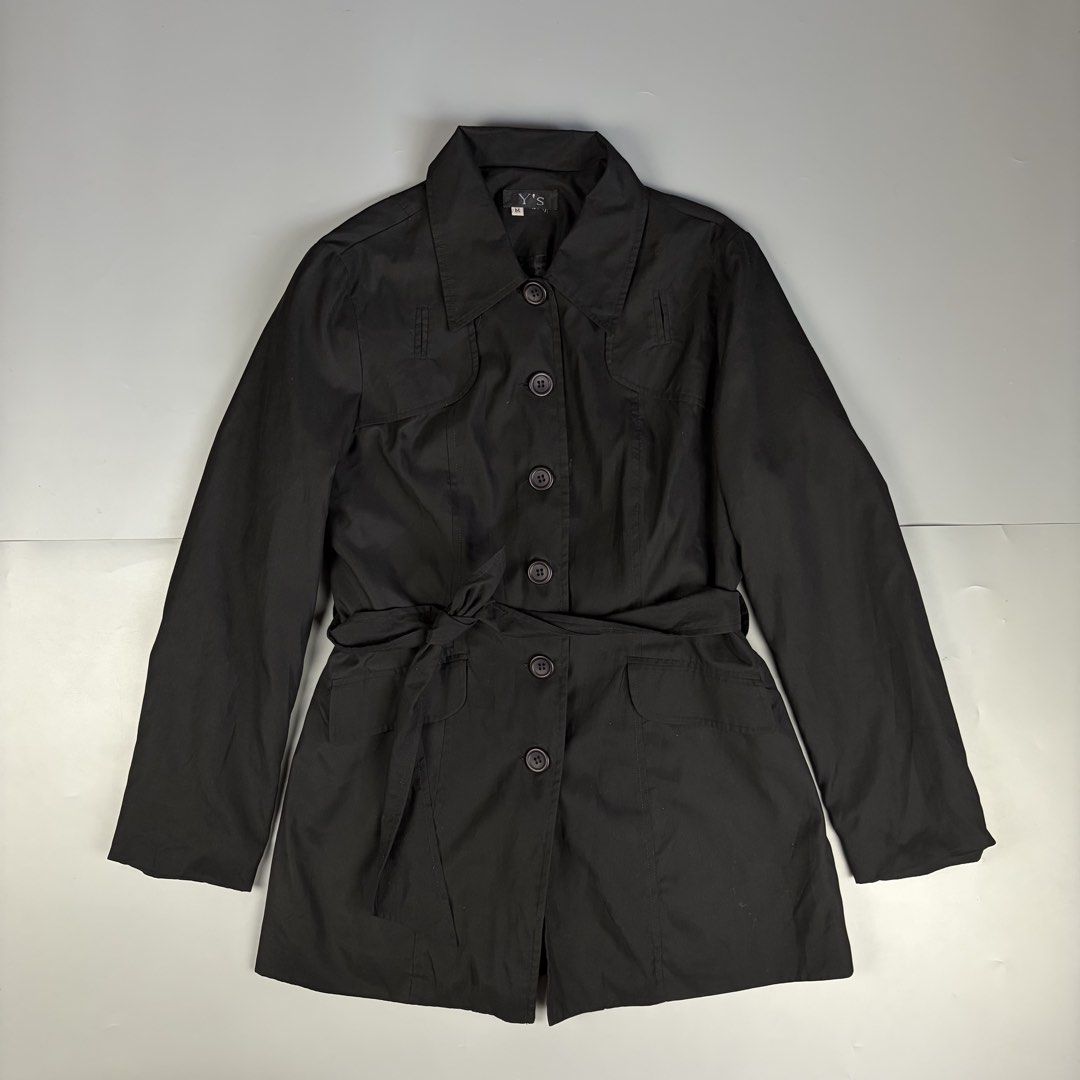 Y’s by Yohji Yamamoto Belted Short Trench Coat (Category: Luxury Apparel) located in Manila. Submitted by yourtherapist_ (Listing ID 1441190647, Image 1). Description: Y’s by Yohji Yamamoto Belted Short Trench Coat Unisex outerwear Size Medium Self authentication required as it does not have a care tag, although it has sign that it used to have some. No flaws Width - 18” Length - 29” Sleeve - 23” 1,500.