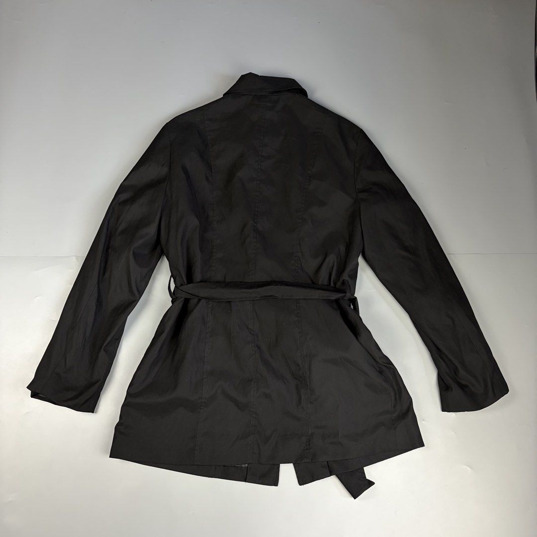 Y’s by Yohji Yamamoto Belted Short Trench Coat (Category: Luxury Apparel) located in Manila. Submitted by yourtherapist_ (Listing ID 1441190647, Image 3). Description: Y’s by Yohji Yamamoto Belted Short Trench Coat Unisex outerwear Size Medium Self authentication required as it does not have a care tag, although it has sign that it used to have some. No flaws Width - 18” Length - 29” Sleeve - 23” 1,500.