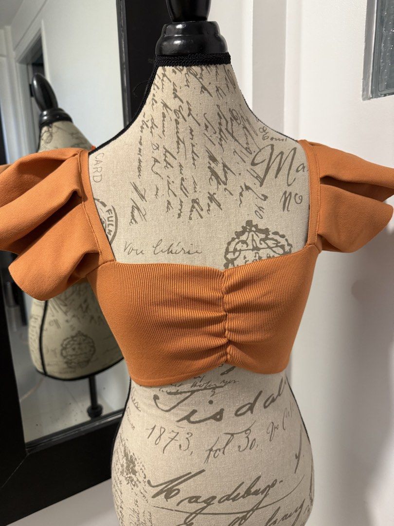 Zara ribbed knit rust orange bralette ruffle top (Category: Others Tops) located in Malabon City. Submitted by splendidcloset (Listing ID 1441191384, Image 1). Description: Never worn .