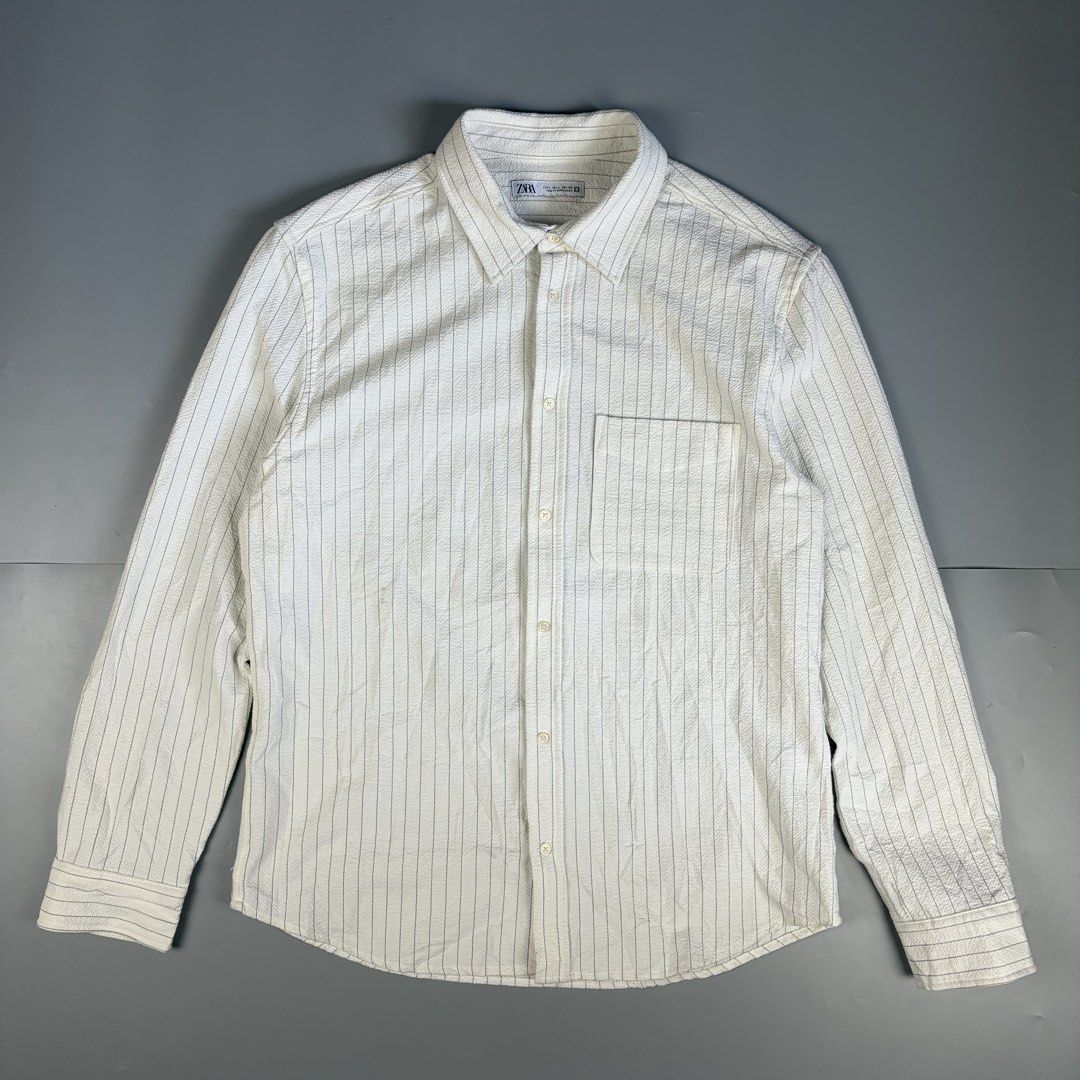 Zara Striped Casual White Button Down Shirt (Category: Formal Shirts) located in Manila. Submitted by yourtherapist_ (Listing ID 1441184632, Image 1). Description: Zara Striped Casual White Button Down Shirt Large Excellent condition 9/10 Width - 22” Length - 28” 850.