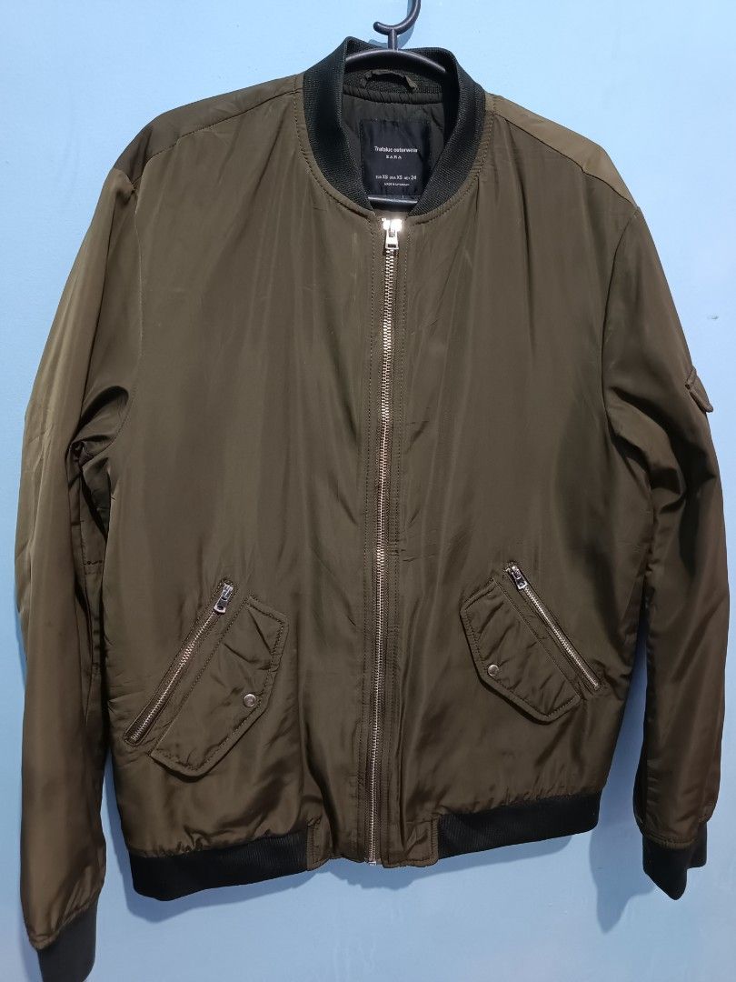 ZARA Trafaluc Outerwear Army Green Bomber Jacket (Category: Coats, Jackets and Outerwear) located in Taguig. Submitted by trendinc (Listing ID 1441355855, Image 3). Description: ZARA Trafaluc Outerwear Army Green Bomber Jacket ‎💸 Price: 500 ‎📏 Dimension (In Inches): Best fit - S to semi Medium ‎ Length: 24 - Width: 19 ‎🎨 Color Rate - 9.5/10 ‎👕 Complete with neck tag and wash tag ‎⚠️ Honest Issue/s: NONE ‎💰 PAYMENT METHOD: GCash (PAYMENT FIRS