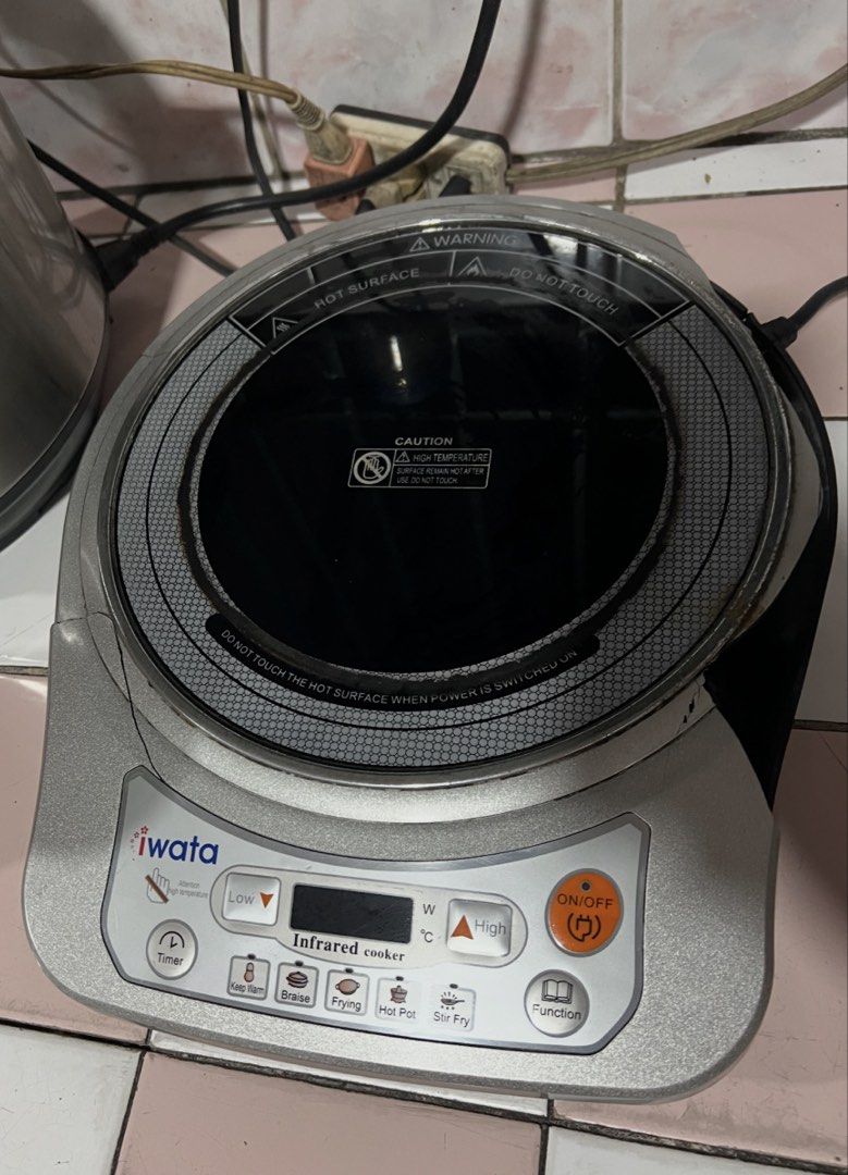 : Iwata Ceramic Cooker CM-12A1 (As-Is Condition) (Category: Cookers) located in Malabon City. Submitted by limbizkit247 (Listing ID 1442992409, Image 3). Description: Selling an Iwata Single Burner Ceramic/Infrared Cooker (Model: CM-12A1, 2000W Max). PLEASE NOTE: Selling this As-Is / For Parts or Repair. The internal heating element and electronics still turn on and work, but the outer housing/top cover is damaged, and the manufacturer does not s