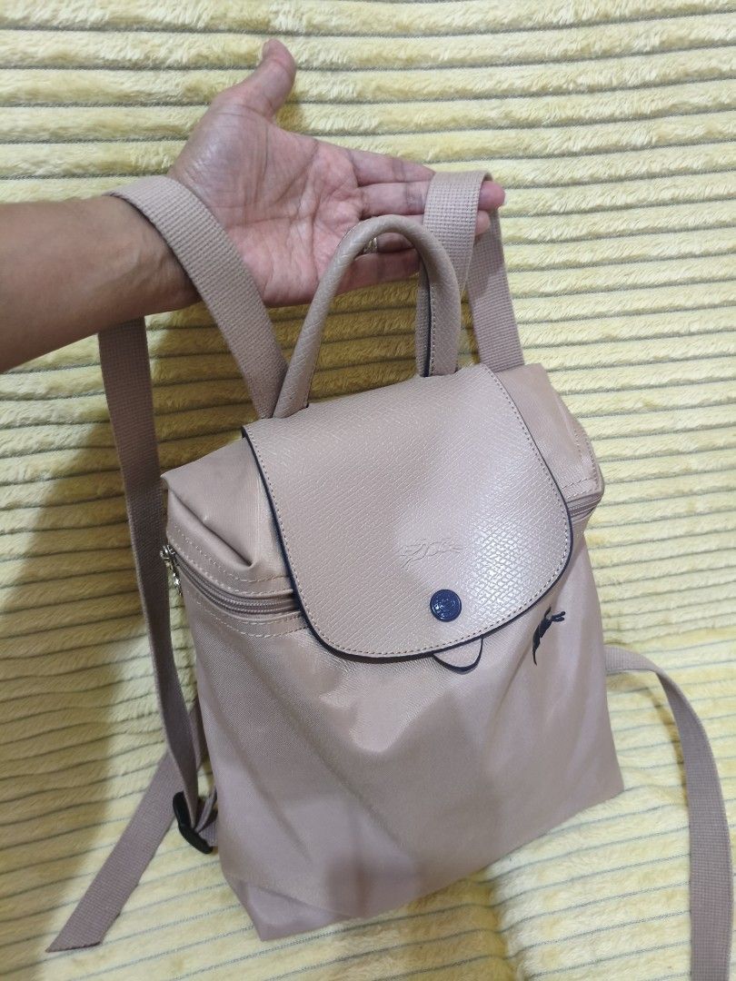 🟣 Longchamp Le Pliage Light Pink Minimalist Backpack rare (Category: Luxury Bags & Wallets) located in Cebu City. Submitted by cherry_05 (Listing ID 1443065782, Image 3). Description: 🎀New Sale🎀 ♡ colors may vary due to lighting ♡ Please make do with the pictures provided. I do not model items. ♡ preloved po so please manage your expectations. ♡ Please ask all questions prior to making an offer as all sales are final. ♡ First to pay owns the i