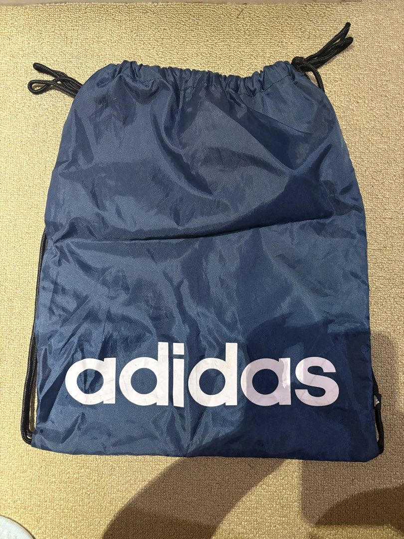 Adidas drawstring backpack (Category: Backpacks) located in Quezon. Submitted by squishymallows (Listing ID 1442971592, Image 1). Description: .