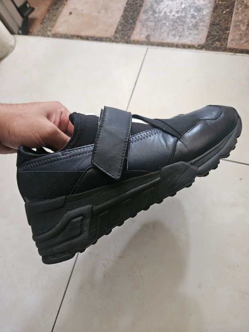Adidas Y-3 Yohji Yamamoto Black Strap Sneakers (Category: Sneakers) located in Singapore. Submitted by lilo0705 (Listing ID 1442993708, Image 1). Description: Y-3 Adidas Yohji Yamamoto Sneakers – EU 38 / US 6.5 – $20 Selling a pair of authentic Y-3 Adidas Yohji Yamamoto sneakers. Details: - Size: EU 38 / US 6.5 / UK 5 - Colour: Black - Pre-owned condition - Y-3 branding intact - Outsoles still have good tread remaining - Normal signs of wear from