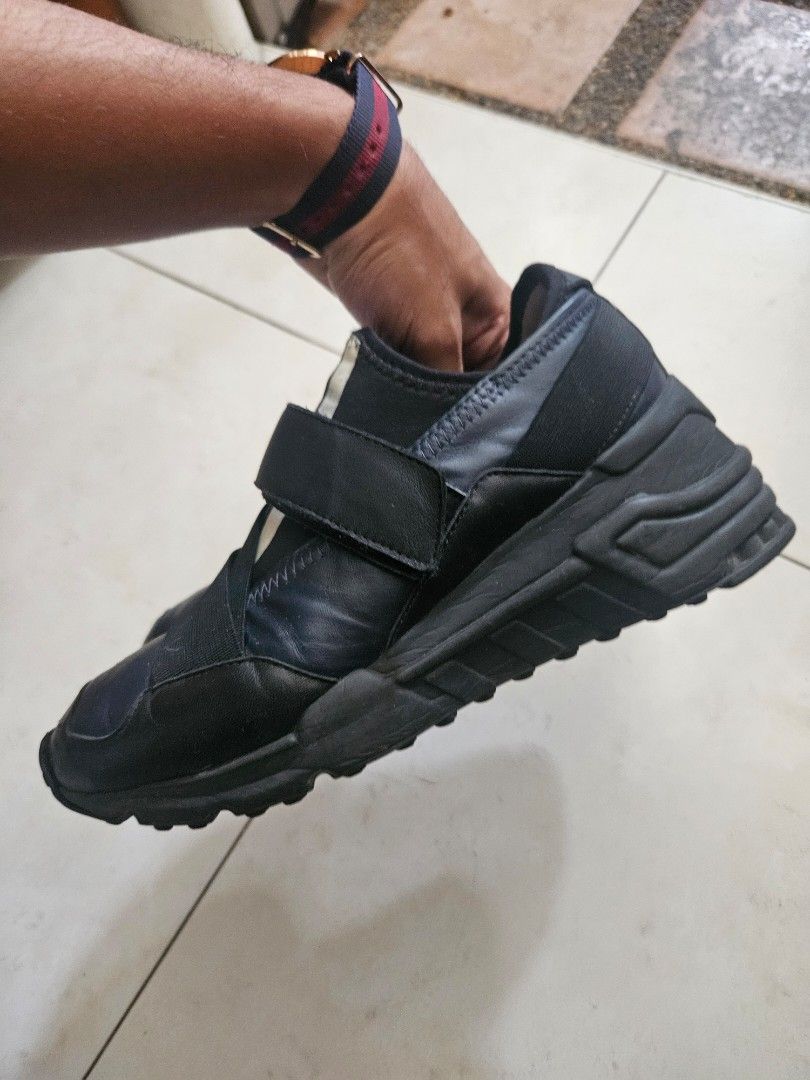 Adidas Y-3 Yohji Yamamoto Black Strap Sneakers (Category: Sneakers) located in Singapore. Submitted by lilo0705 (Listing ID 1442993708, Image 3). Description: Y-3 Adidas Yohji Yamamoto Sneakers – EU 38 / US 6.5 – $20 Selling a pair of authentic Y-3 Adidas Yohji Yamamoto sneakers. Details: - Size: EU 38 / US 6.5 / UK 5 - Colour: Black - Pre-owned condition - Y-3 branding intact - Outsoles still have good tread remaining - Normal signs of wear from