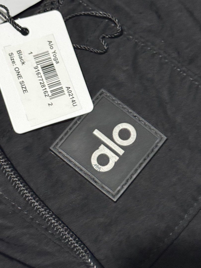 Alo Yoga Black Drawstring Bucket Bag One Size (Category: Cross-body Bags) located in Bulacan. Submitted by elihoh (Listing ID 1443046733, Image 3). Description: - Brand new Alo Yoga bucket bag - Color: Black - Closure: Drawstring - Strap: Adjustable - Features: Front pocket with Alo logo - Condition: Original tags attached - Ideal for: Everyday use, gym sessions.