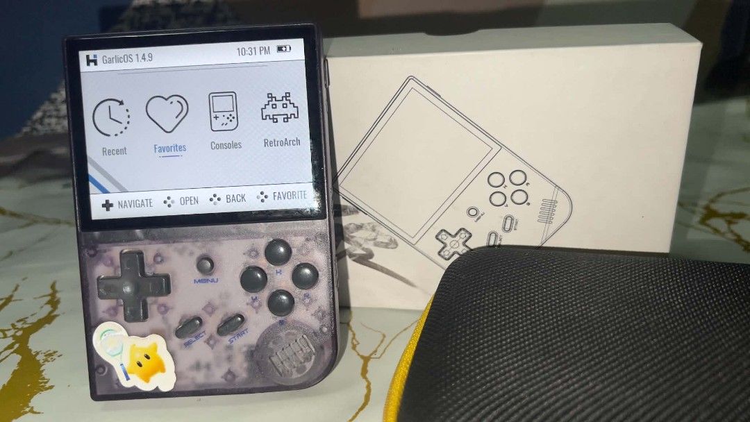 ANBERNIC RG35XX (Category: Others) located in Manila. Submitted by diceei (Listing ID 1443035022, Image 1). Description: - ANBERNIC RG35XX retro gaming handheld - Comes with original box - Includes protective carrying case and manual - Perfect for retro game enthusiasts.